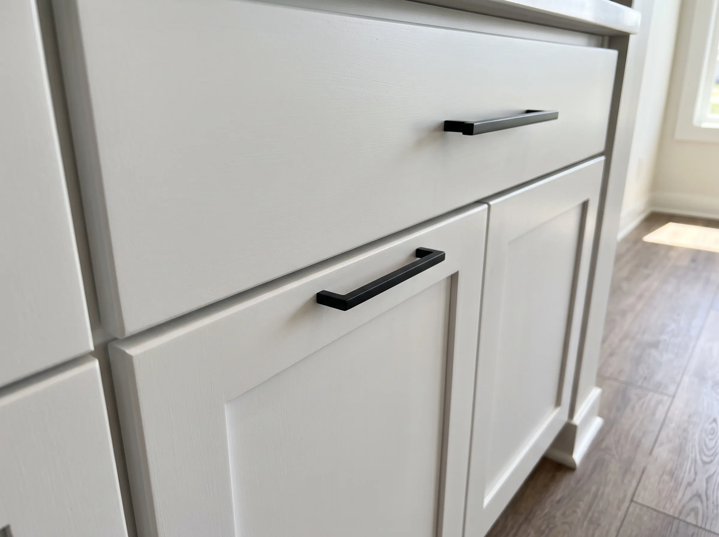 Close-up of new cabinet hardware after refinishing
