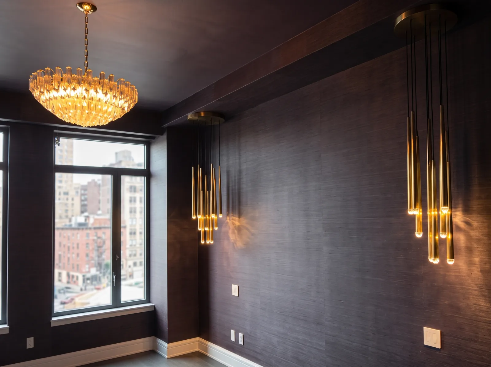 Dark textured wallpaper in a luxury bedroom with chandelier